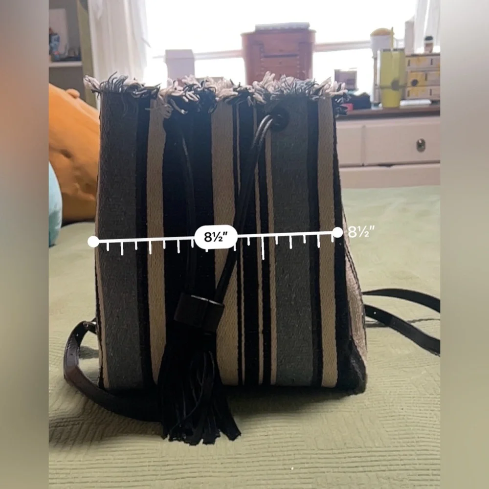 Lucky Brand Alzon Drawstring Clinched Fringed Backpack Blue, Black and Cream
